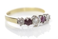 Lot 355 - RUBY AND DIAMOND RING set with three diamonds...