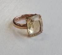 Lot 357 - CITRINE DRESS RING set in nine carat gold