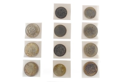 Lot 83 - A COLLECTION OF SILVER CHINESE DOLLARS AND HALF DOLLARS