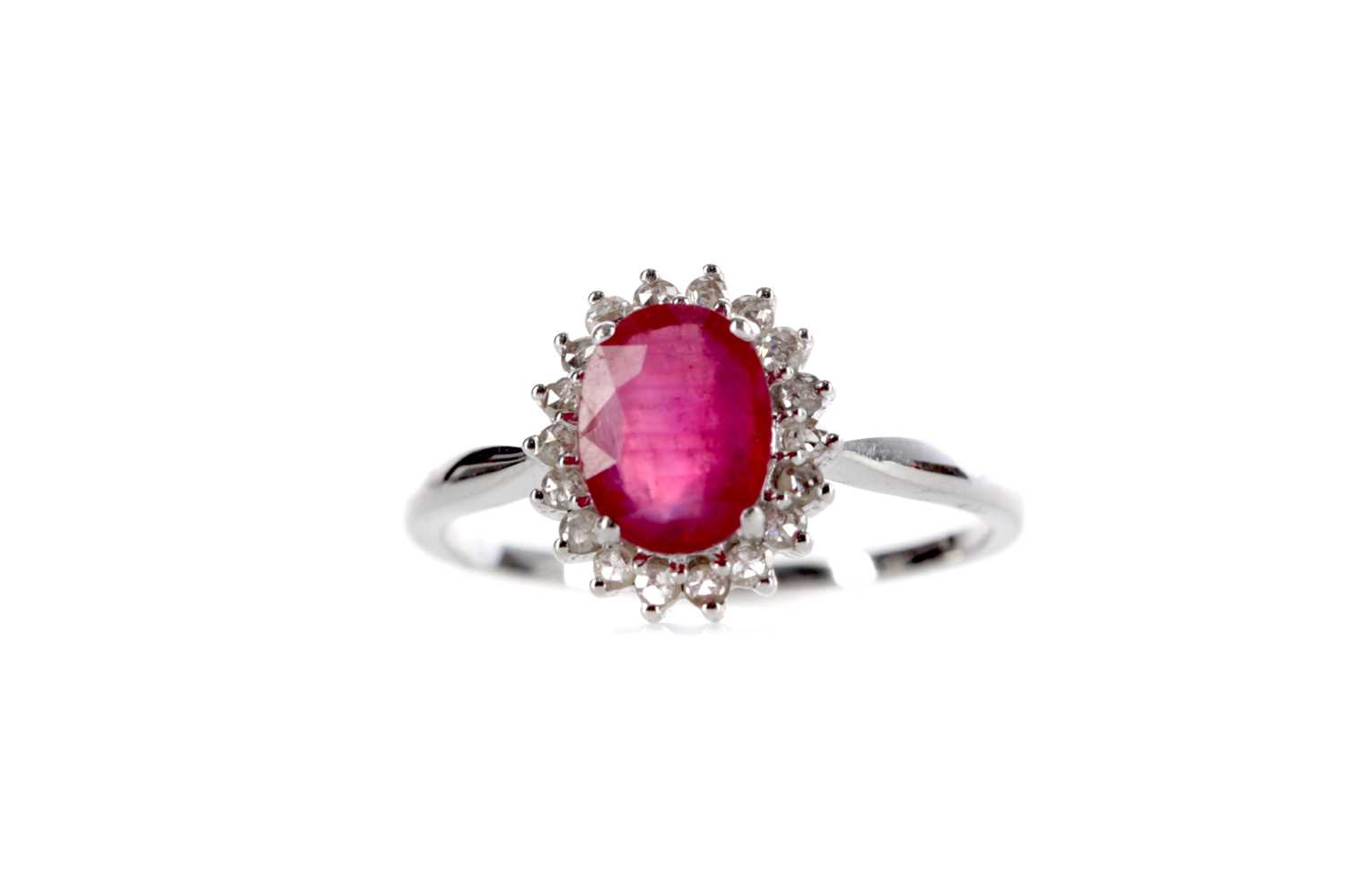 Lot 369 - A RUBY AND DIAMOND CLUSTER RING