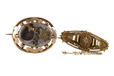Lot 434 - A VICTORIAN MOURNING BROOCH AND A BAR BROOCH