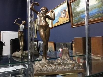 Lot 264 - AN ART DECO FIGURAL TABLE LIGHTER