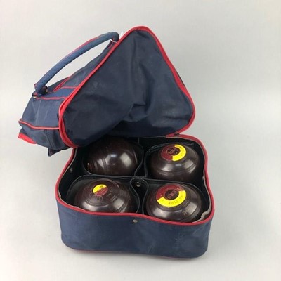 Lot 185 - A SET OF FOUT LIGNOID LAWN BOWLS