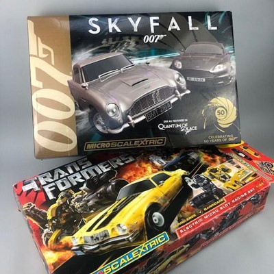 Lot 183 - A LOT OF TWO SCALEXTRIC GAMES AND A TRANSFORMERS SET