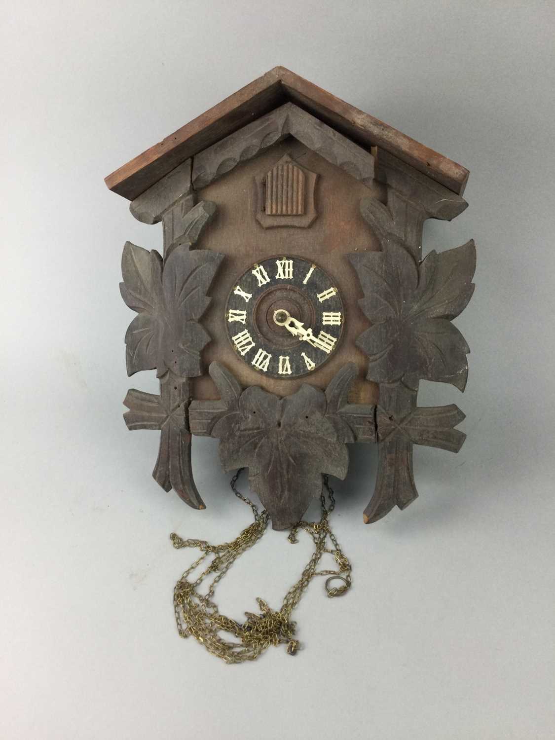 Lot 209 - A GERMAN CUCKOO CLOCK