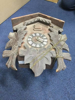 Lot 209 - A GERMAN CUCKOO CLOCK