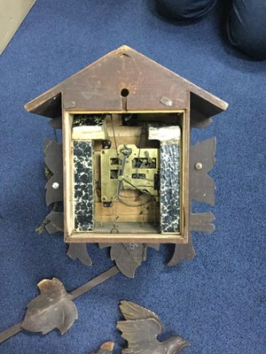 Lot 209 - A GERMAN CUCKOO CLOCK