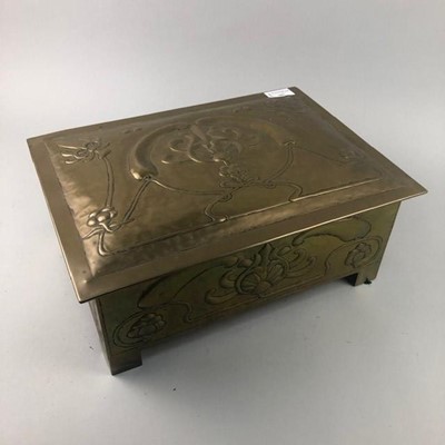 Lot 381 - AN EARLY 20TH CENTURY EMBOSSED BRASS SLIPPER BOX