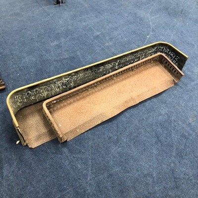 Lot 218 - A VICTORIAN BRASS FENDER AND ANOTHER