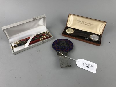 Lot 300 - A ROYAL ARTILLERY CAR BADGE AND OTHERS