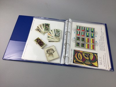 Lot 12 - A COLLECTION OF STAMPS, POSTCARDS AND CIGARETTE CARDS