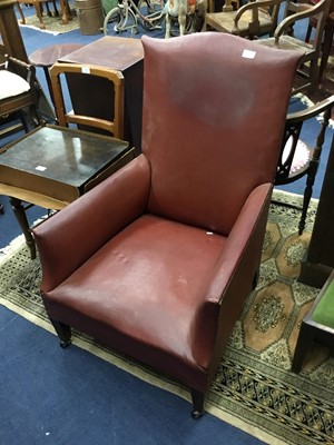 Lot 419 - AN EARLY 20TH CENTURY LEATHER ARMCHAIR AND A NEST OF THREE TABLES