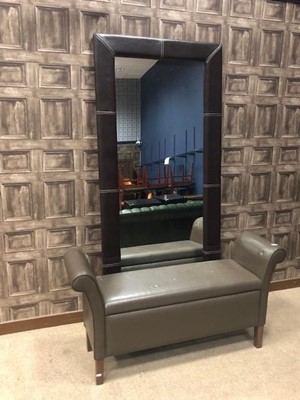 Lot 429 - A FAUX LEATHER WALL MIRROR AND A MODERN OTTOMAN