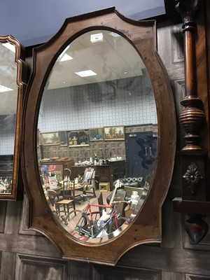 Lot 566 - A WALNUT FRAMED WALL MIRROR AND ONE OTHER