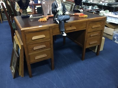 Lot 532 - AN OAK KNEEHOLE DESK AND AN ARMCHAIR