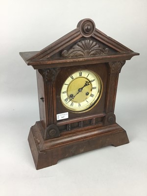 Lot 547 - A LATE VICTORIAN OAK BRACKET CLOCK