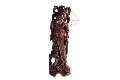 Lot 412 - A CHINESE CARVED HARDWOOD FIGURAL LAMP