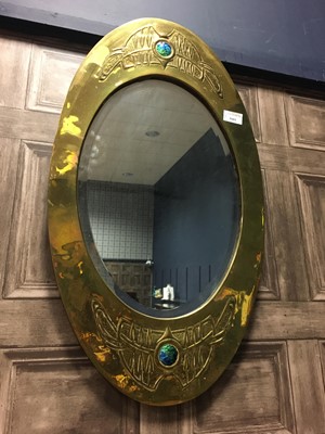 Lot 1601 - AN ARTS & CRAFTS BRASS AND ENAMEL MARQUISE SHAPED WALL MIRROR