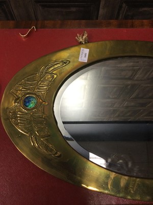 Lot 1601 - AN ARTS & CRAFTS BRASS AND ENAMEL MARQUISE SHAPED WALL MIRROR