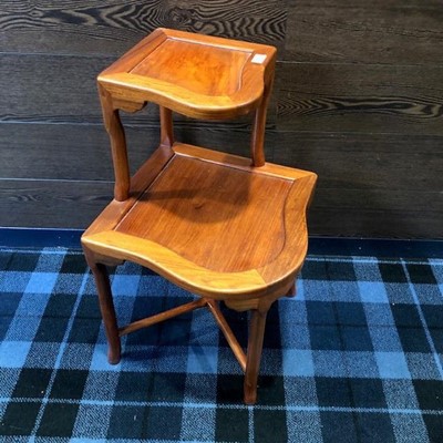 Lot 570 - A HARDWOOD TWO TIER CORNER TABLE