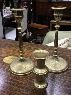 Lot 581 - A CANTEEN OF BRASS CUTLERY ALONG WITH CANDLESTICKS, PLATES AND A PRINT