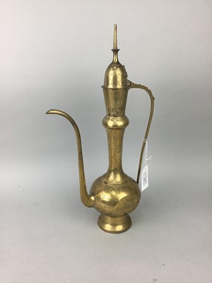 Lot 646 - A MIDDLE EASTERN EWER AND A SWORD