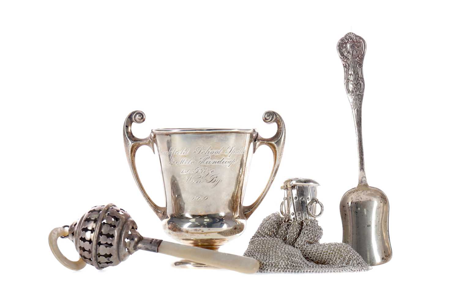 Lot 520 - AN EARLY 20TH CENTURY SILVER TROPHY CUP ALONG WITH A RATTLE, A SCOOP AND A PURSE