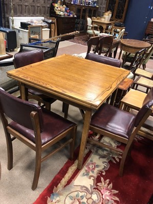 Lot 653 - AN OAK TABLE AND FOUR CHAIRS