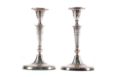 Lot 527 - A PAIR OF NEO-CLASSICAL SILVER CANDLESTICKS