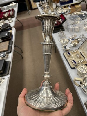 Lot 527 - A PAIR OF NEO-CLASSICAL SILVER CANDLESTICKS