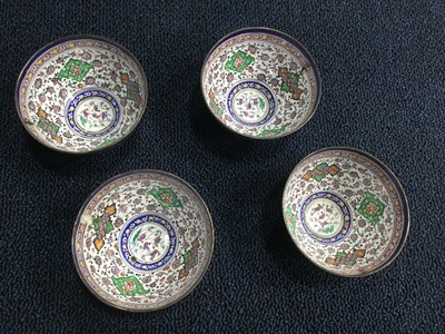 Lot 746 - A SET OF FOUR MIDDLE EASTERN ENAMELLED BOWLS