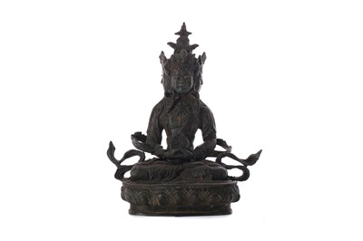 Lot 745 - AN EASTERN BRONZED FIGURE OF A SEATED DEITY