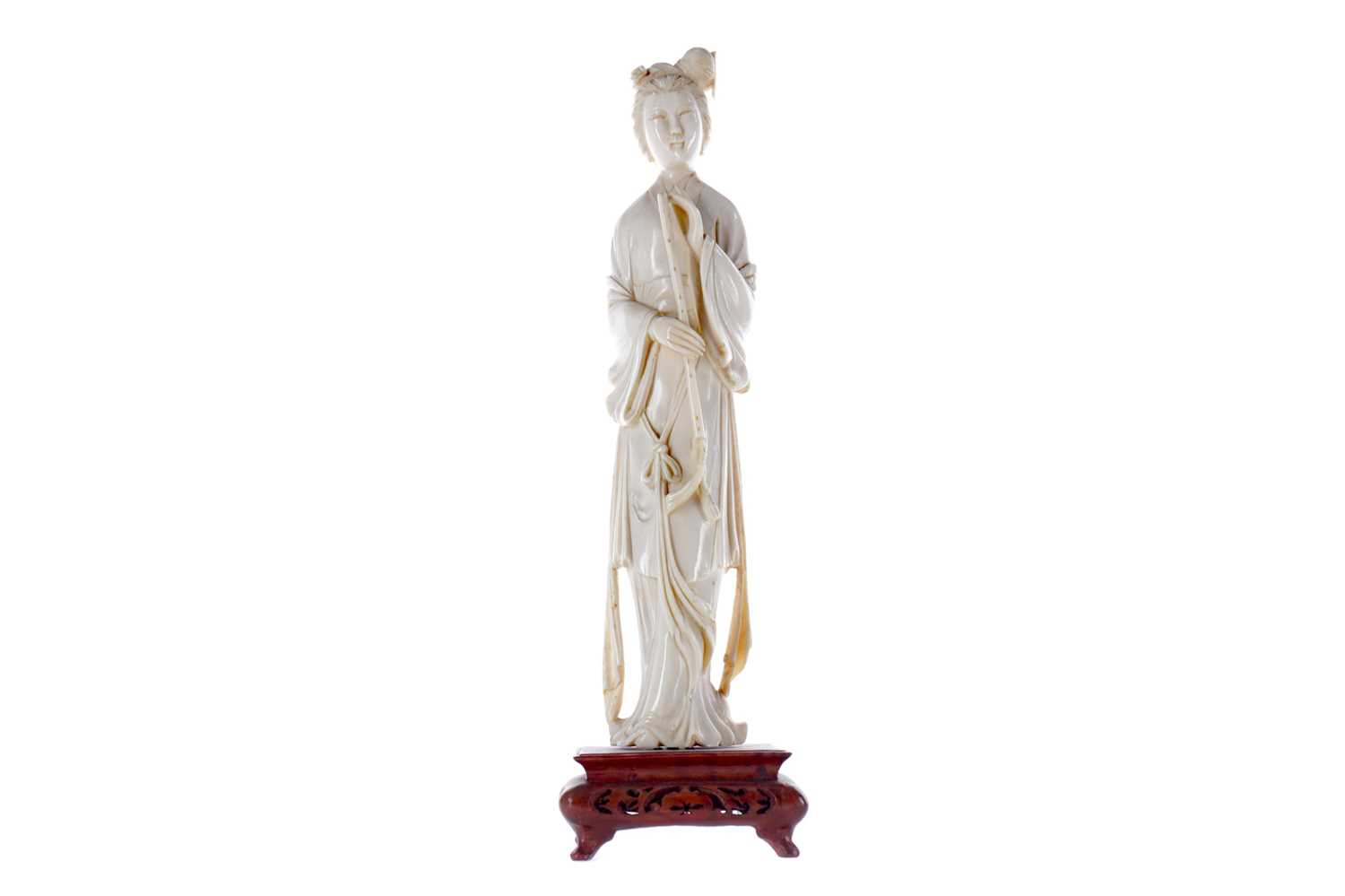 Lot 751 - A LATE 19TH/EARLY 20TH CENTURY CHINESE IVORY CARVING OF A FEMALE