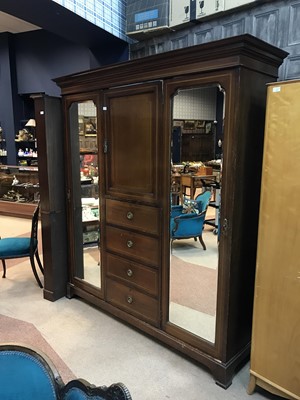 Lot 825 - A MAHOGANY TRIPLE DOOR WARDROBE