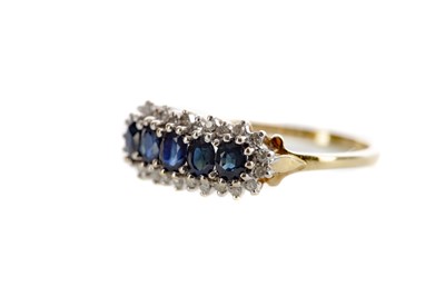 Lot 1377 - A BLUE GEM SET AND DIAMOND RING