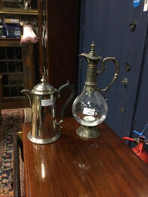 Lot 845 - A GLASS AND SILVER PLATED CLARET JUG AND A WATER JUG