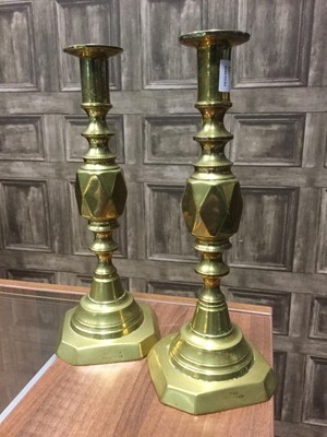 Lot 846 - A PAIR OF 'THE DIAMOND PRINCESS' BRASS CANDLESTICKS