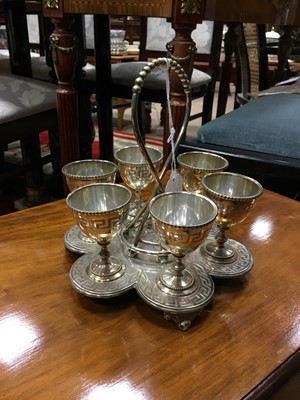 Lot 850 - A SILVER PLATED SIX EGG CUP EPERGNE
