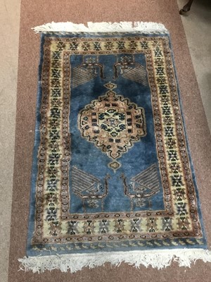 Lot 883 - AN EASTERN BORDERED RUG