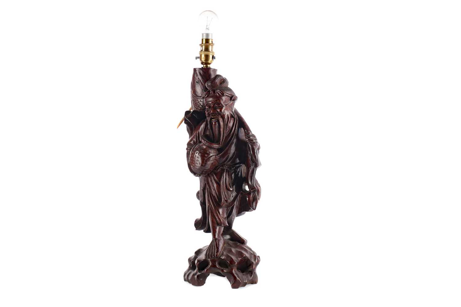 Lot 777 - AN EARLY 20TH CENTURY CHINESE CARVED HARDWOOD FIGURAL LAMP