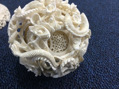 Lot 803 - AN EARLY 20TH CENTURY CHINESE IVORY CONCENTRIC BALL ON STAND