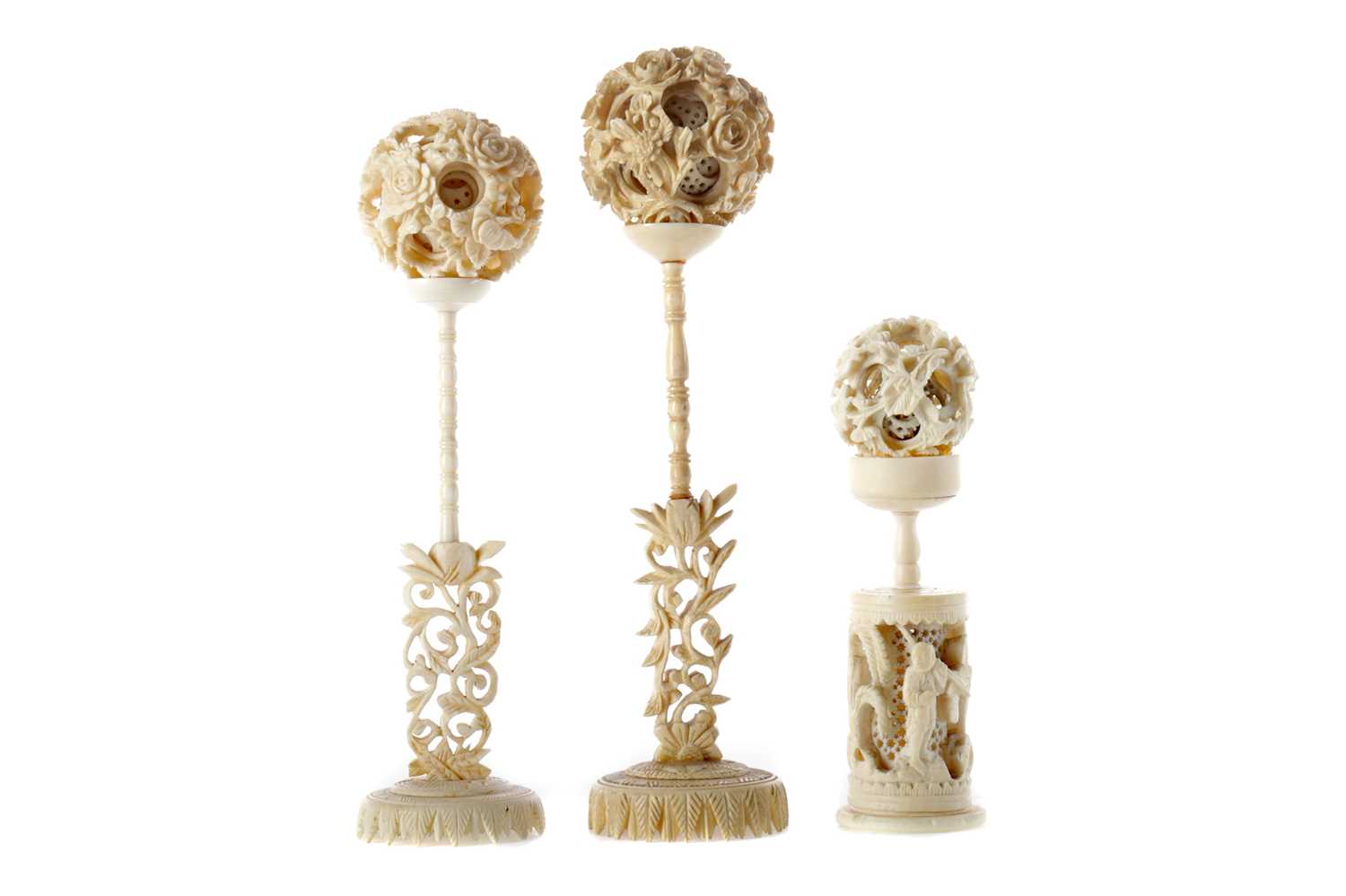 Lot 806 - A LOT OF THREE EARLY 20TH CENTURY CHINESE IVORY CONCENTRIC BALLS WITH STANDS