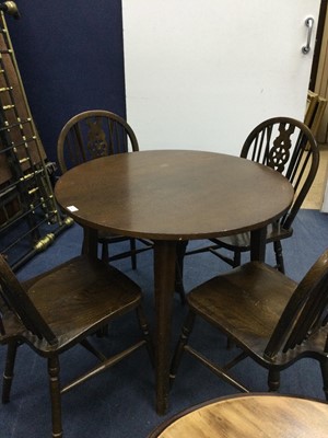 Lot 905 - A STAINED WOOD CIRCULAR DINING TABLE AND FOUR CHAIRS