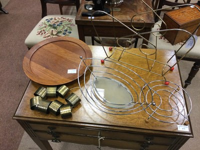 Lot 915 - A LAZY SUSAN ALONG WITH A FRUIT BASKET, STAND, NAPKIN RINGS AND A MAGAZINE RACK