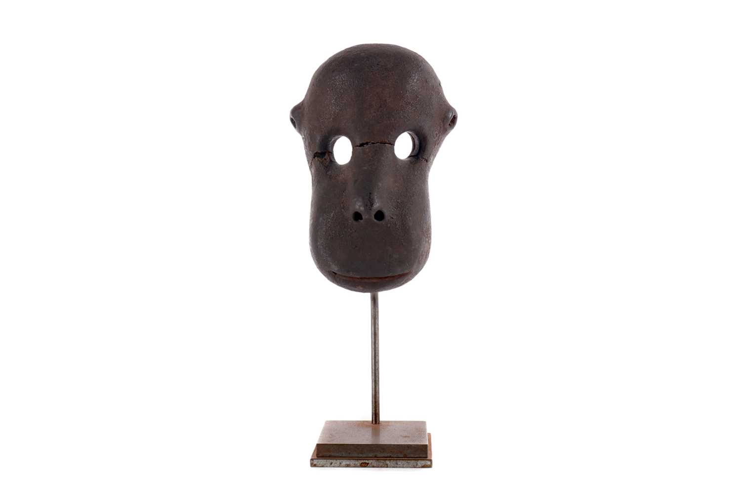 Lot 838 - AN AFRICAN POTTERY MODEL OF A MONKEY FACE
