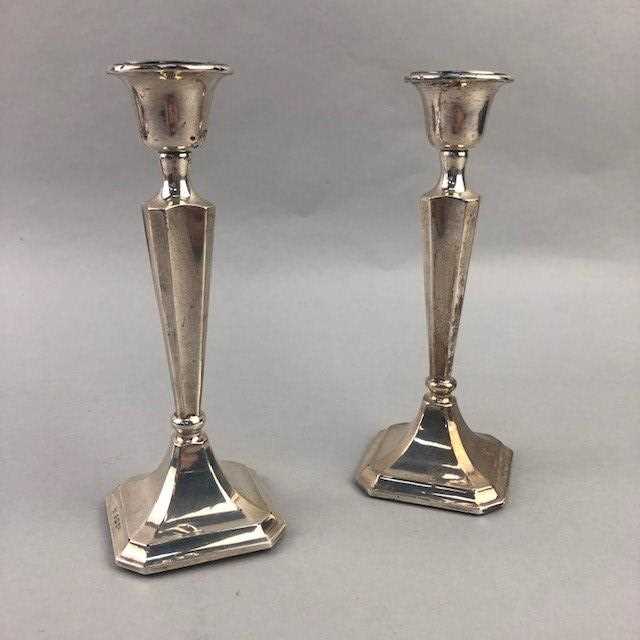 Lot 26 - A PAIR OF SILVER CANDLESTICKS