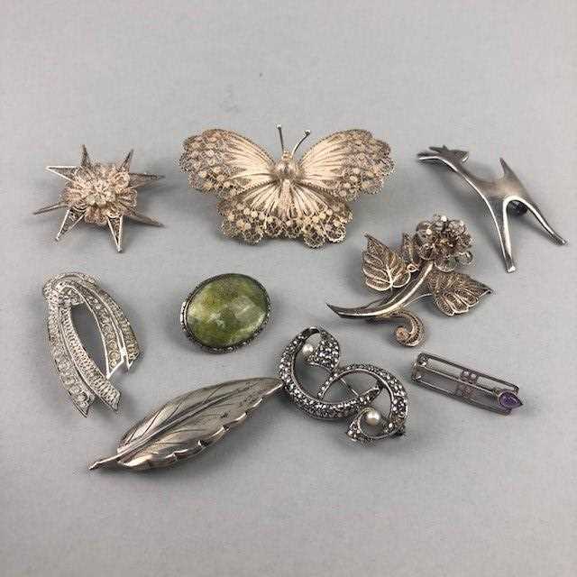 Lot 25 - A LOT OF NINE SILVER BROOCHES