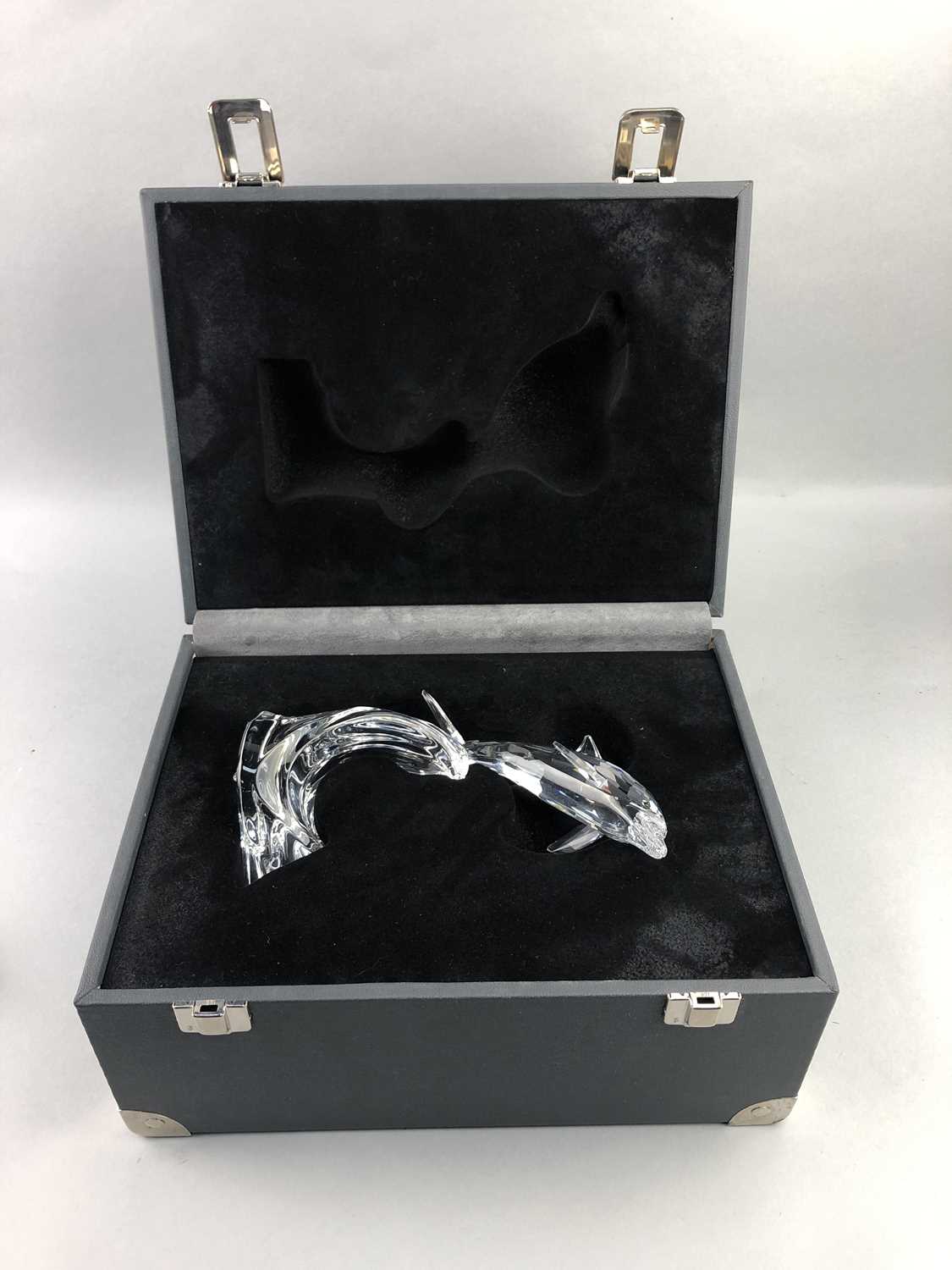 Lot 142 - A SWAROVSKI SILVER CRYSTAL FIGURE OF A DOLPHIN AND THREE OTHER SMALLER FISH FIGURES