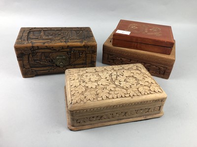 Lot 47 - A LOT OF SIX CARVED WOODEN BOXES AND A MASK
