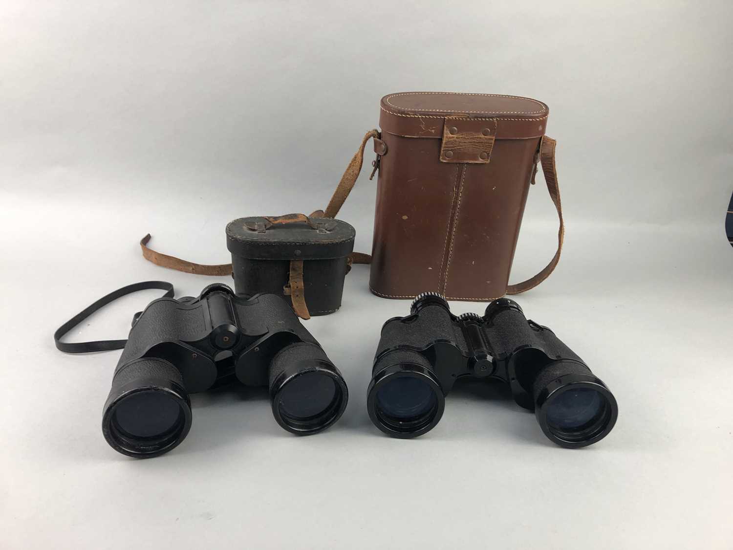 Lot 54 - A LOT OF TWO PAIR OF BINOCULARS AND TWO RELATED CASES